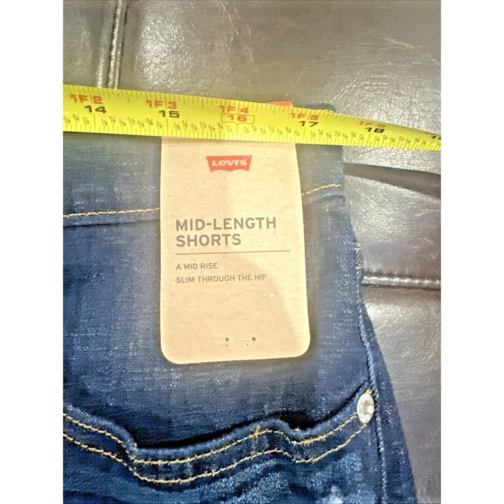 Levi's Women Size 33 Mid Length Blue Denim Shorts Cuffed Dark Distressed Stretch